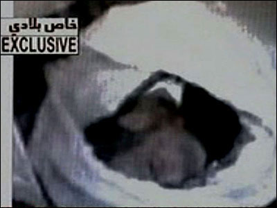 伊拉克政府公布了萨达姆的尸体画面是为了证实他的死亡真实性.