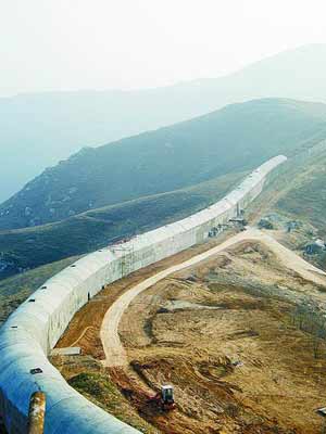 :河南省郑州市新郑龙湖镇 是属于什么区的啊?